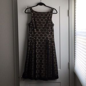 Maggie London fit and flare black and nude  dress.